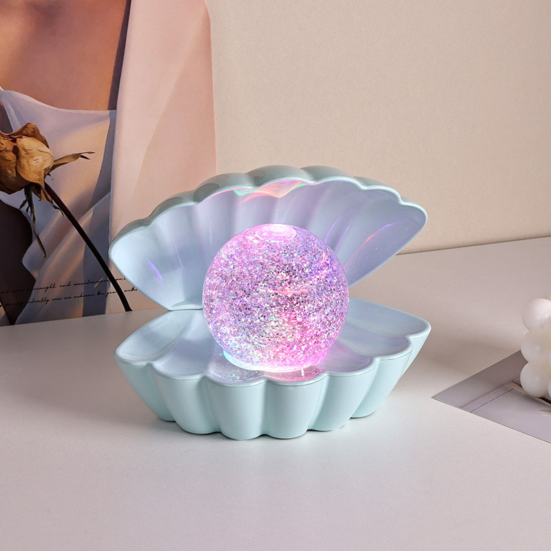 Lampe Shell RVB avec liquide pailleté